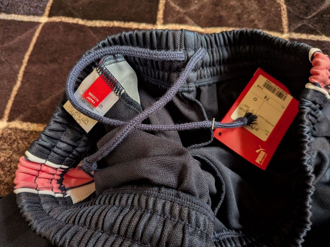 【未使用・タグ付き】プーマジャージ下のみ Oサイズ ネイビー×ピンク