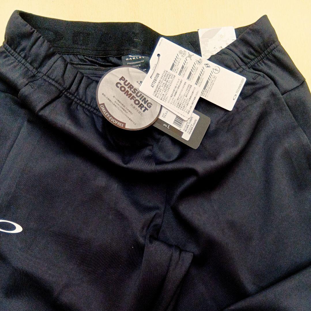 [新品] オークリー OAKLEY 上下セット パーカ ジョガーパンツ 白黒 L