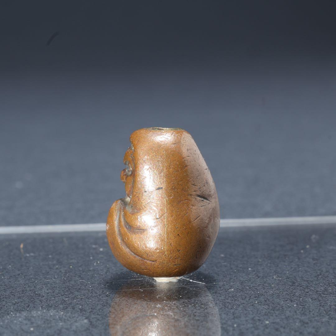 緒締め玉　達磨　提げもの　金属　茶色　金工　R1641