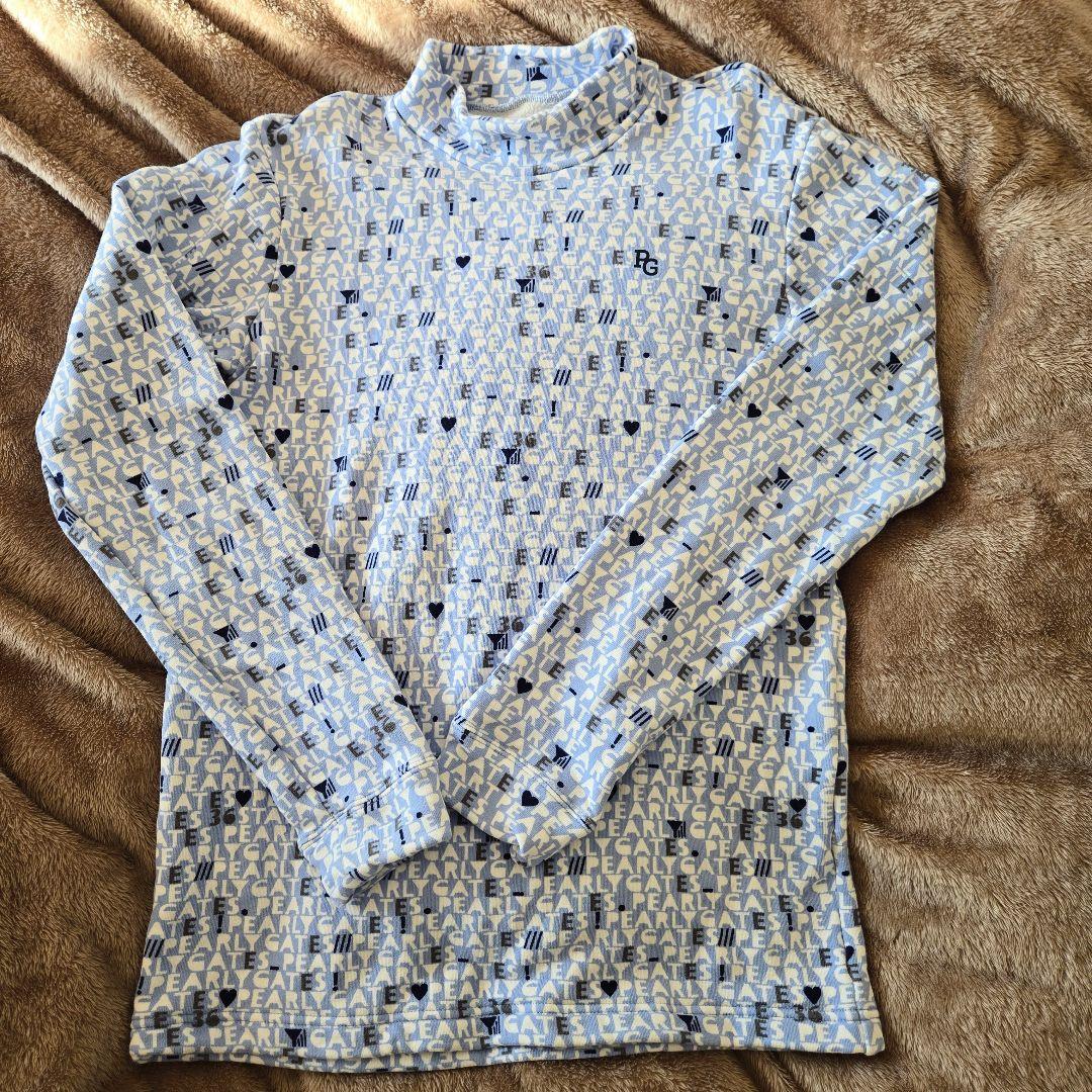 未使用に近い PEARLY GATES モックネックシャツ 水色 サイズ4/M