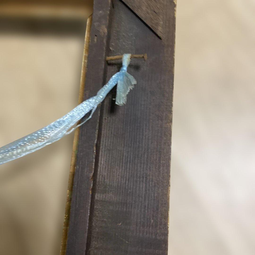 海辺の少女の油彩画