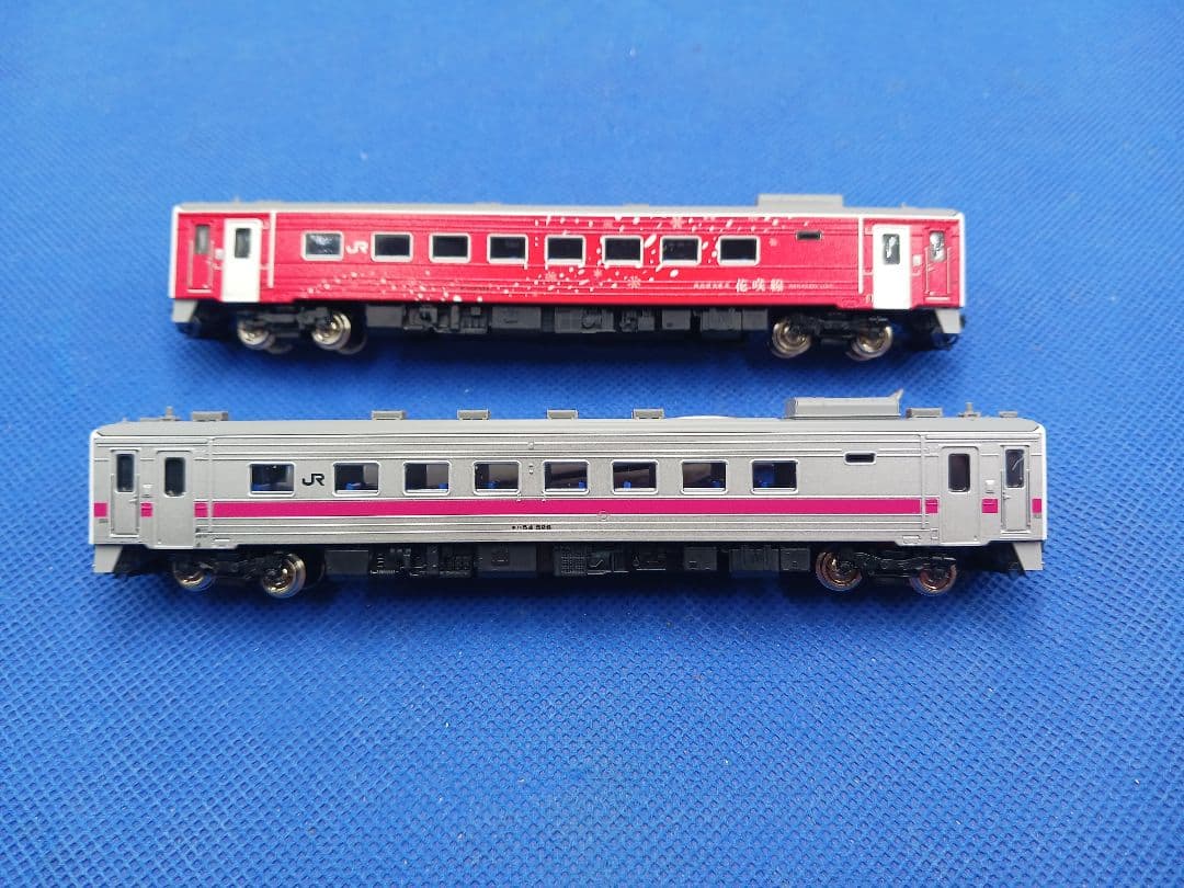 GM 50712 30408 地球探索鉄道花咲線ラッピングトレイン ピンク帯2両