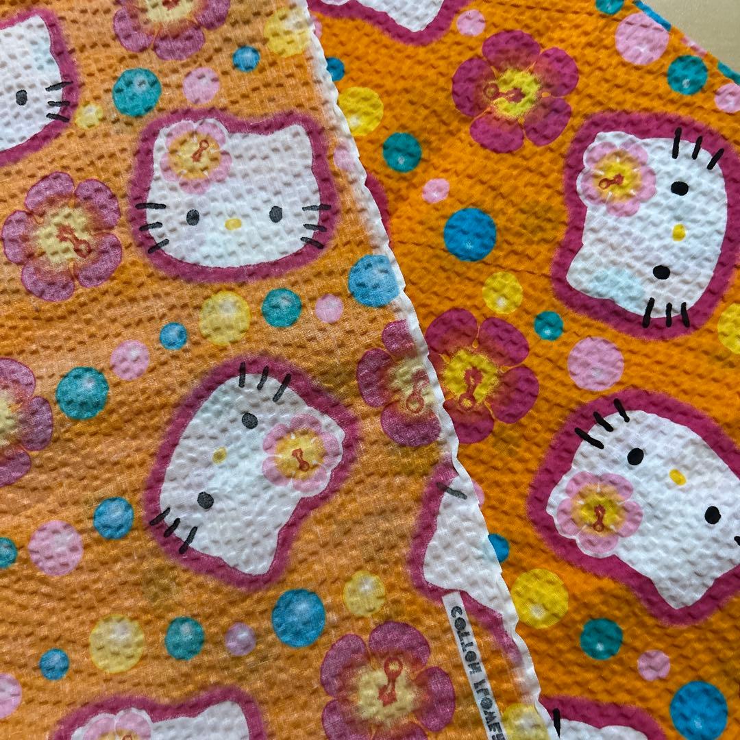 キティ　ちりめん　カオハナ　オレンジ　生地　ハギレ