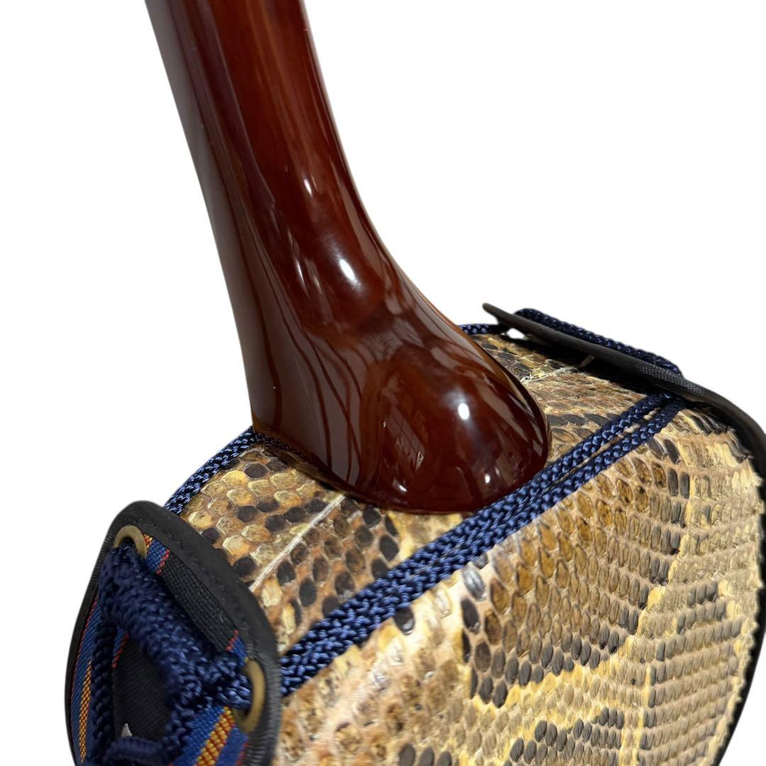 新城慎幸作 三線 紅木棹 本蛇皮強化張り 保証書付 ハードケース付 沖縄三線