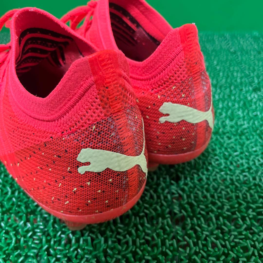 プーマ サッカースパイクフューチャーZ 1.4 HG/AG(オレンジ×イエロー)