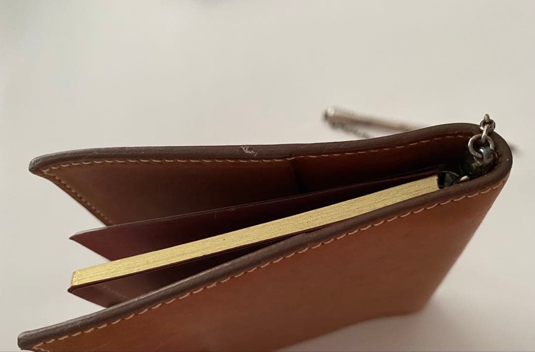 エルメス茶色い革手帳ボールペン付き