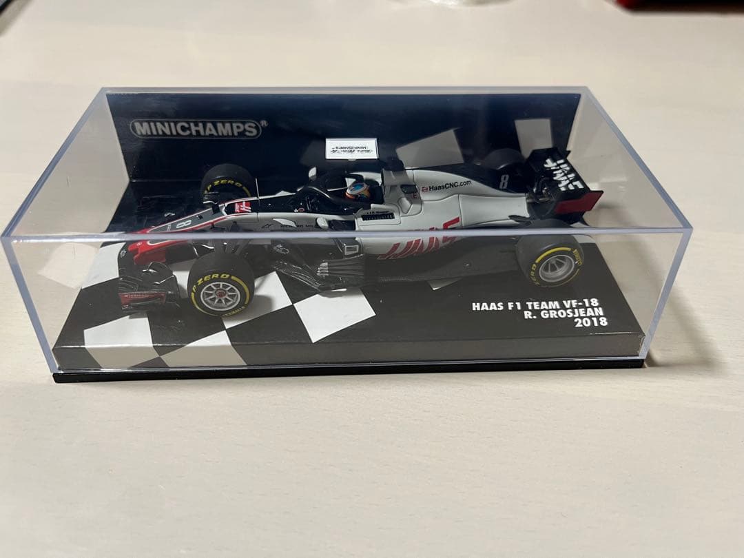 ミニチャンプスHAAS F1 VF-18 R. GROSJEAN 2018
