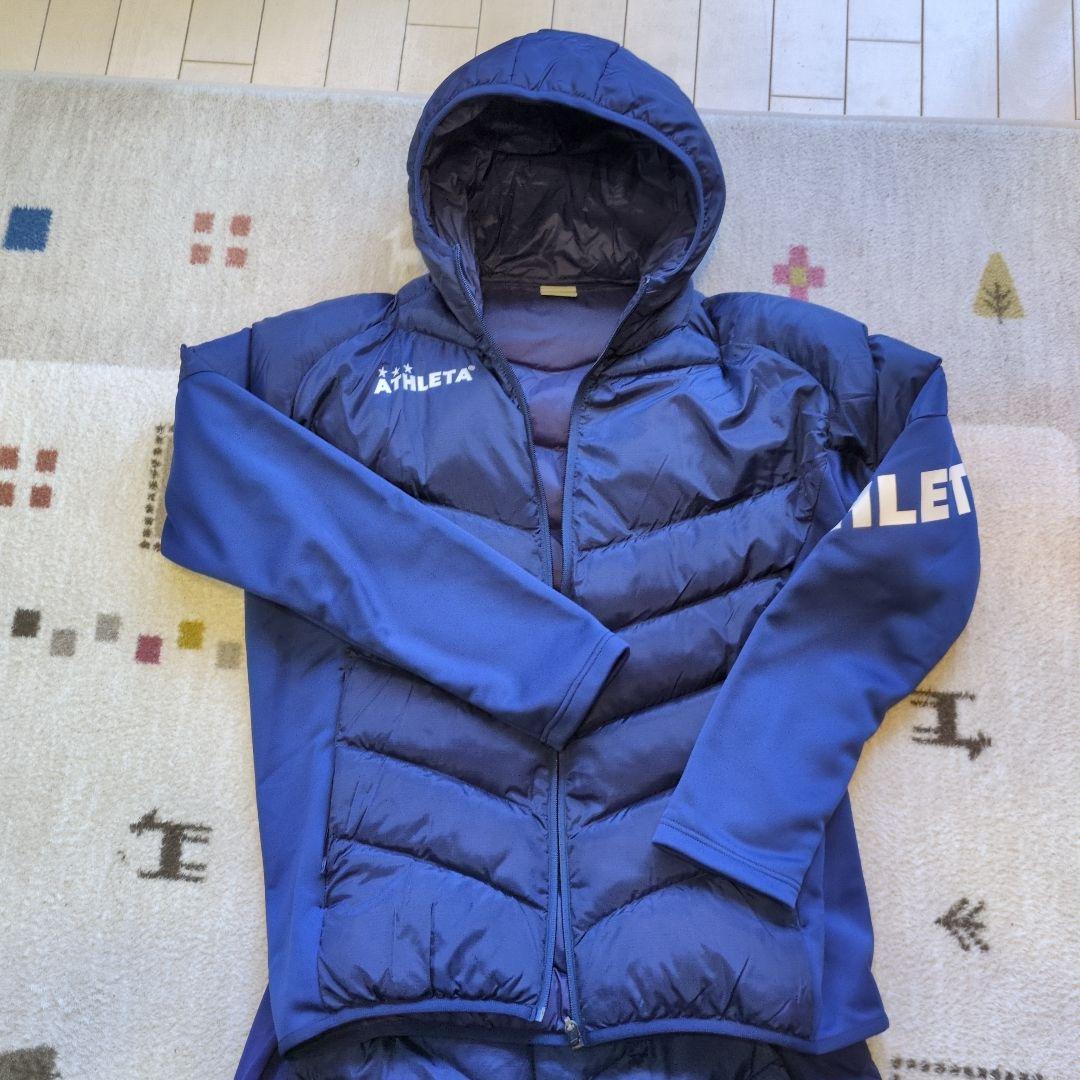 ATHLETA ピステ・ウィンドブレーカー サイズ38 ネイビー