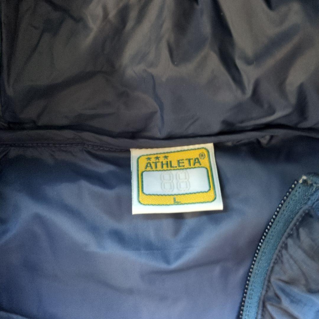 ATHLETA ピステ・ウィンドブレーカー サイズ38 ネイビー