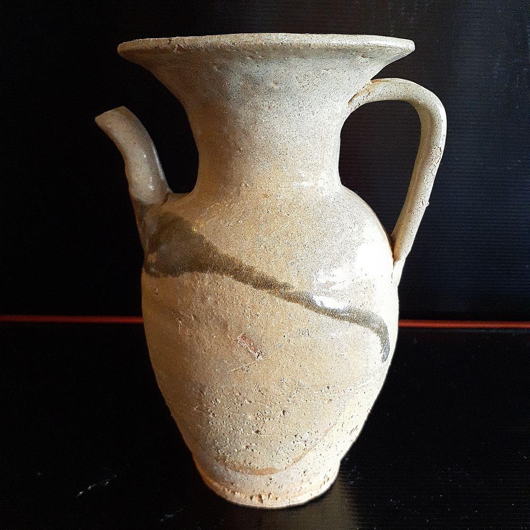 唐代長沙窯黄秞褐彩壺