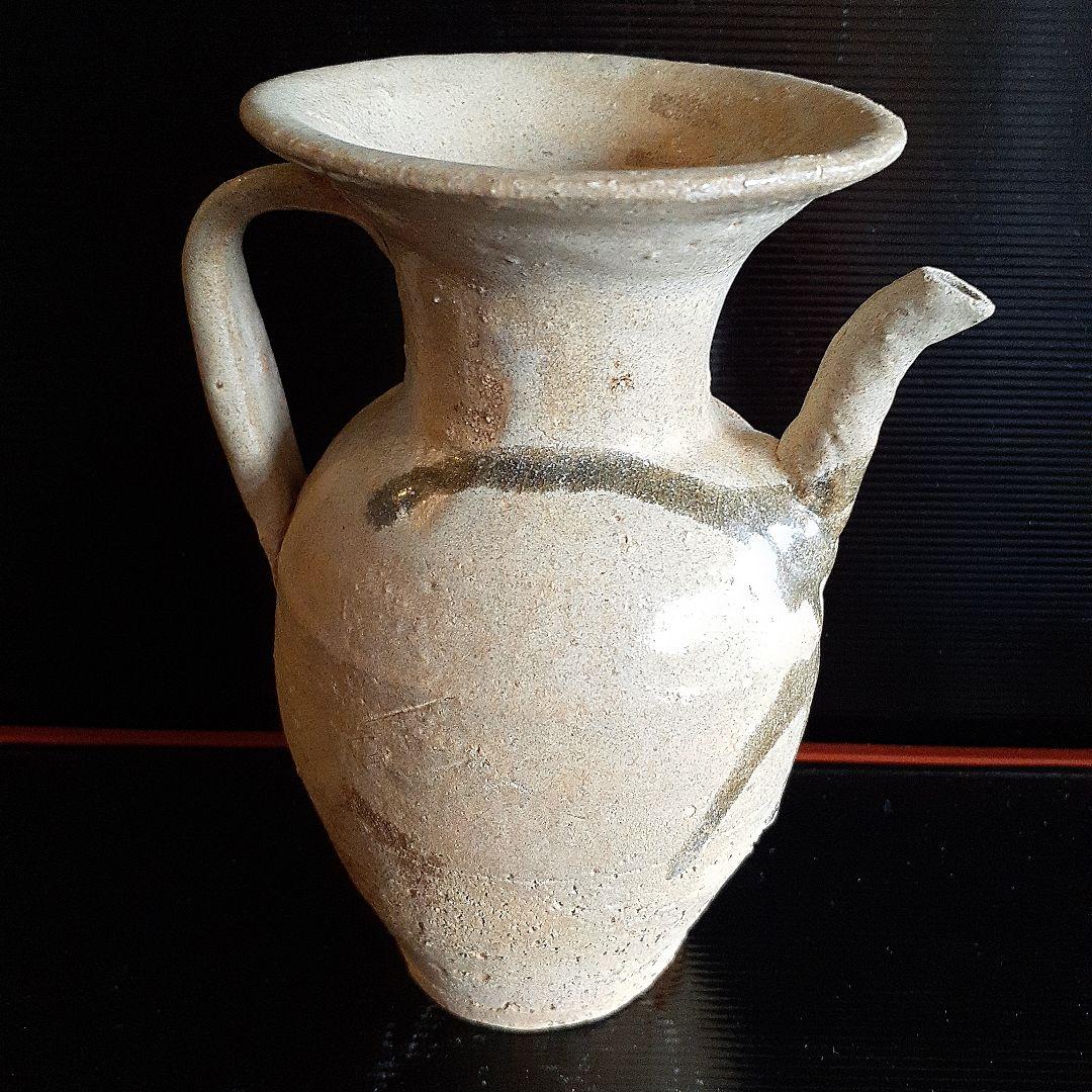 唐代長沙窯黄秞褐彩壺