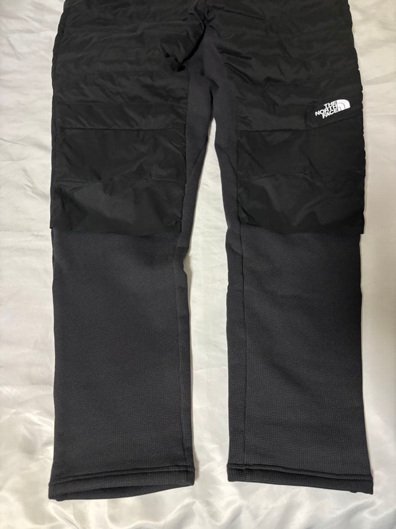 ザノースフェイス・ランニングダウンウェアNY82495レッドランロングパンツ黒Ｍ