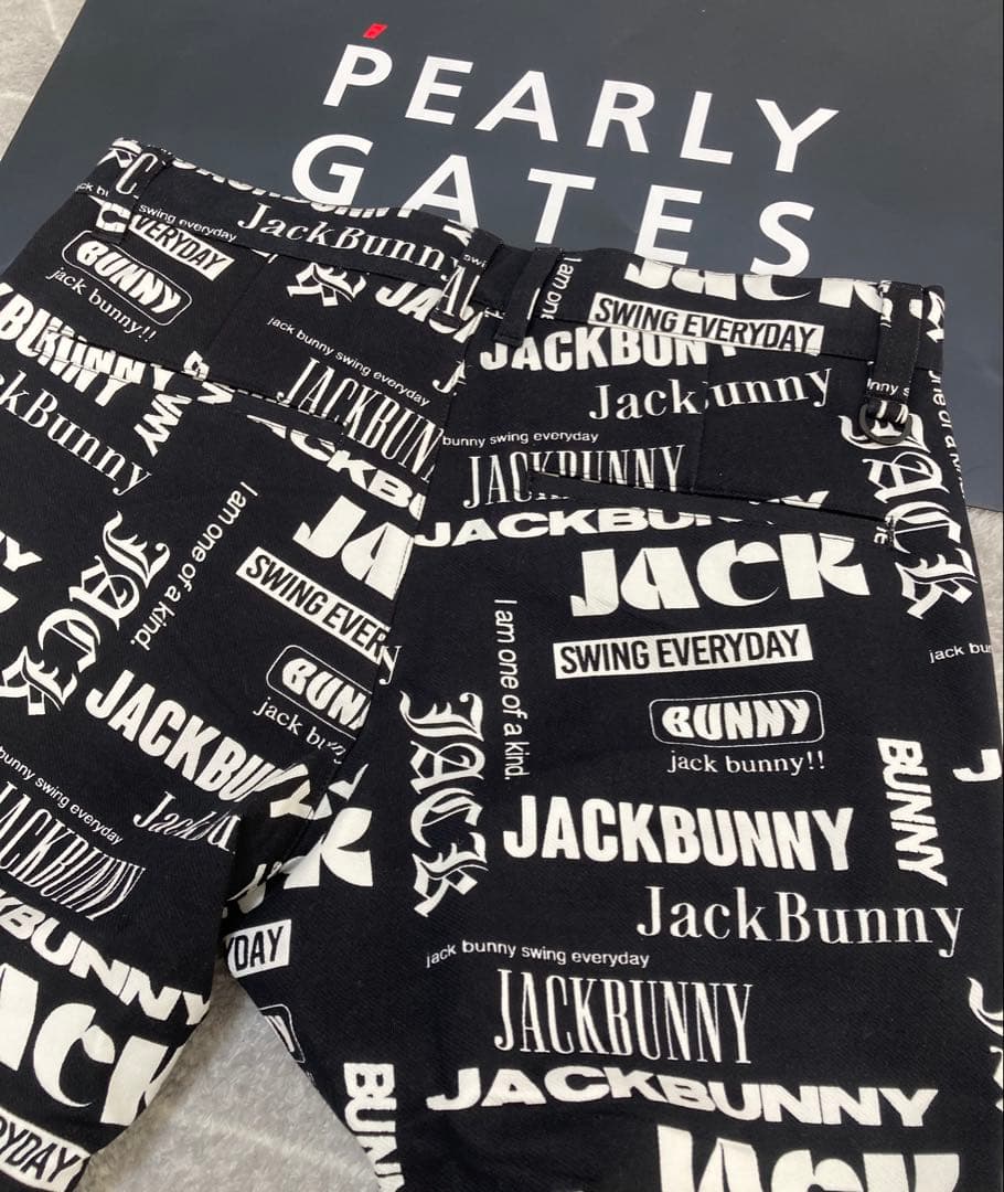 新品 パーリーゲイツ ジャックバニー ツイル 総柄テーパードパンツ(4)M/黒