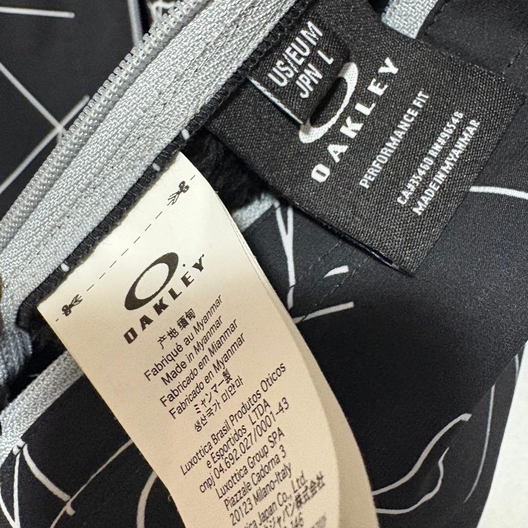 オークリー ゴルフ 長袖 メンズ スカル リバーシブル ウィンド ジャケット