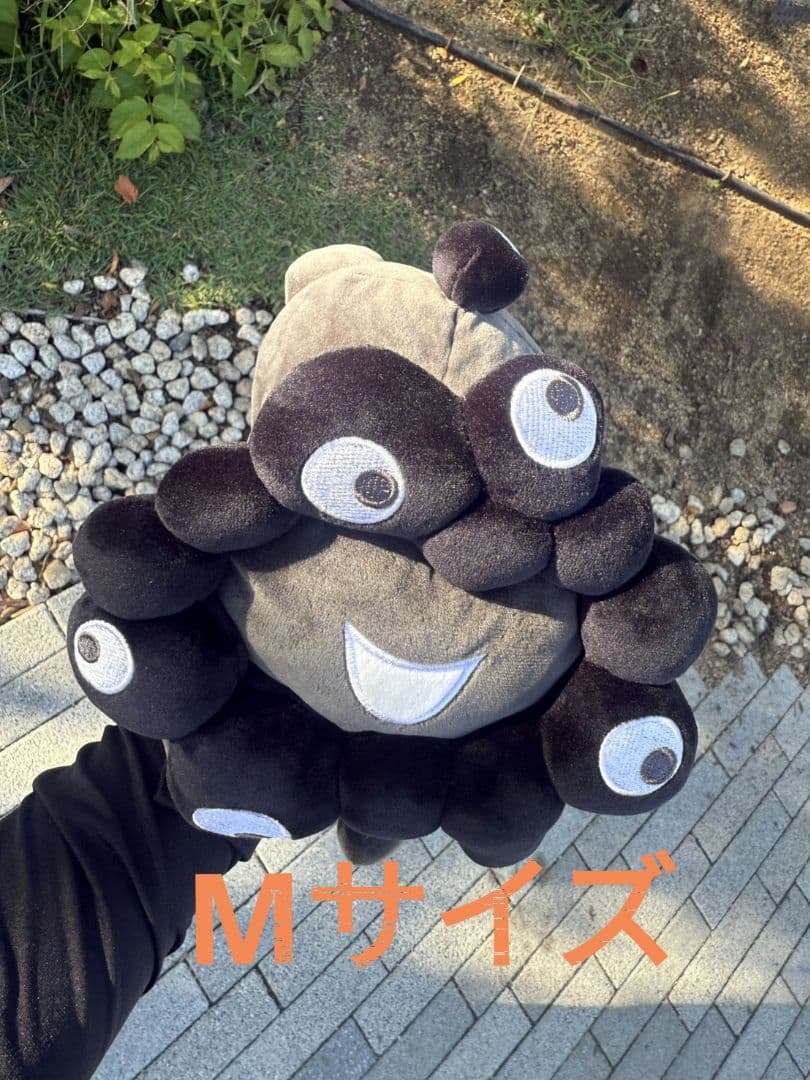 【値下げ】EXPO2025 黒ミャクミャク 這型 ぬいぐるみ M 寝そべり