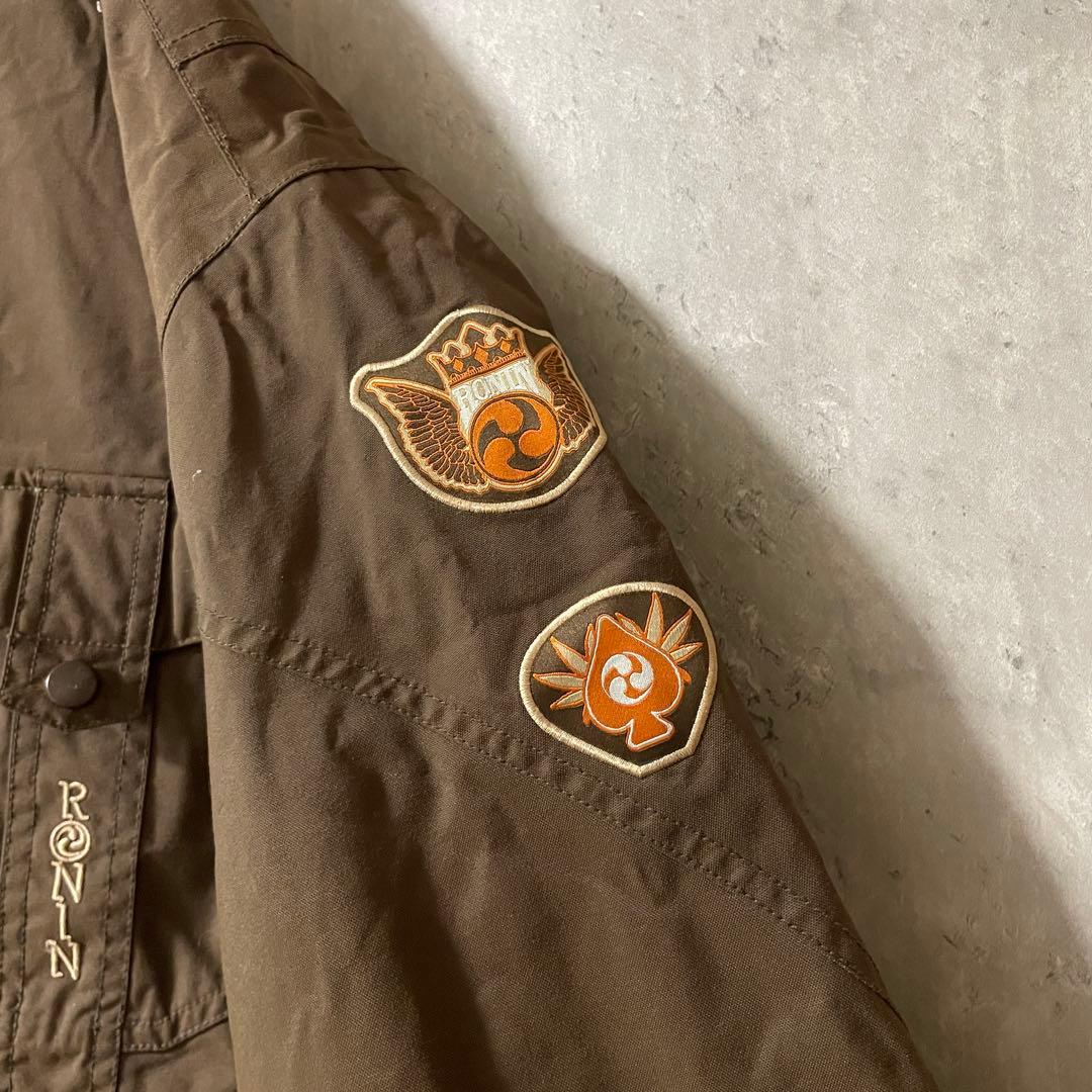 Burtonバートンスキーウェアスノーボードジャケットパーカーフード茶色ブラウン