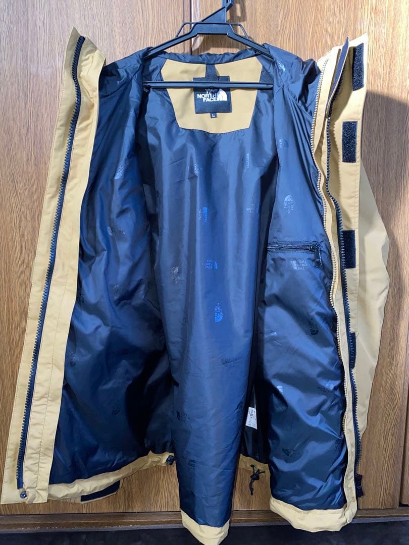 The North Face フード付きジャケット ベージュ