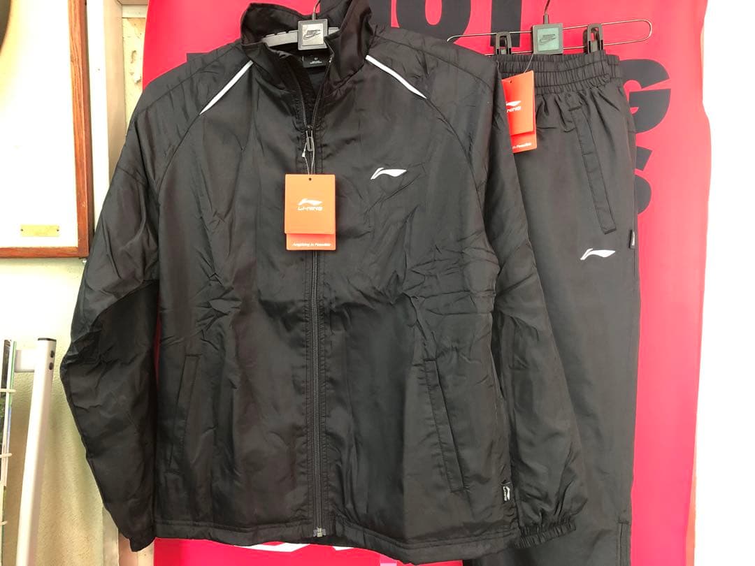 新品 LI-NING ウインドブレーカー上L 下M シンプルな黒