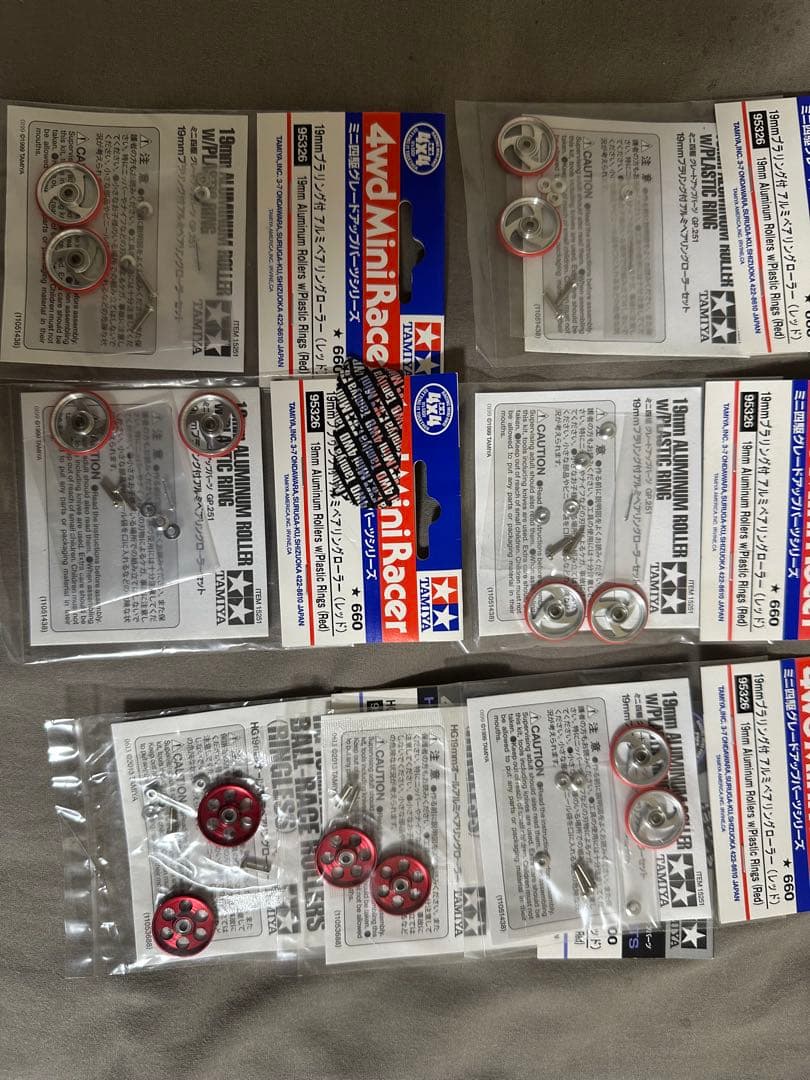 ミニ四駆パーツまとめ売り純正赤ローラ多数! (ローラー未使用)12日まで!