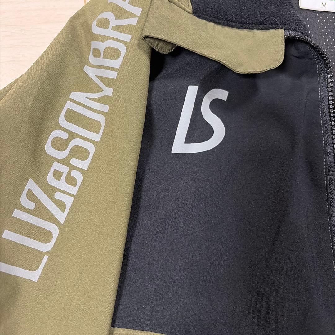 LUZ e SOMBRA ピステ・ウィンドブレーカー M カーキ