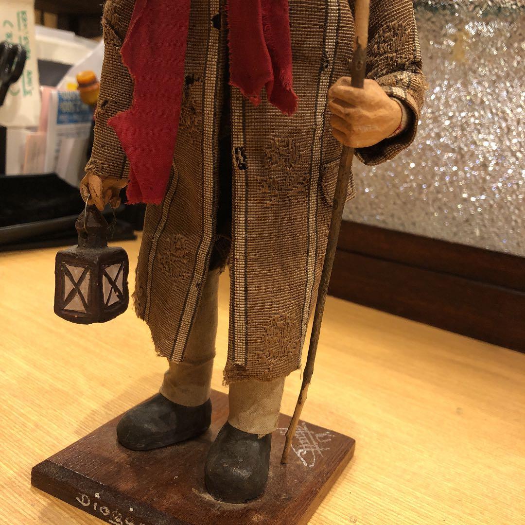 フランスアンティーク　街路灯に火を灯す老人