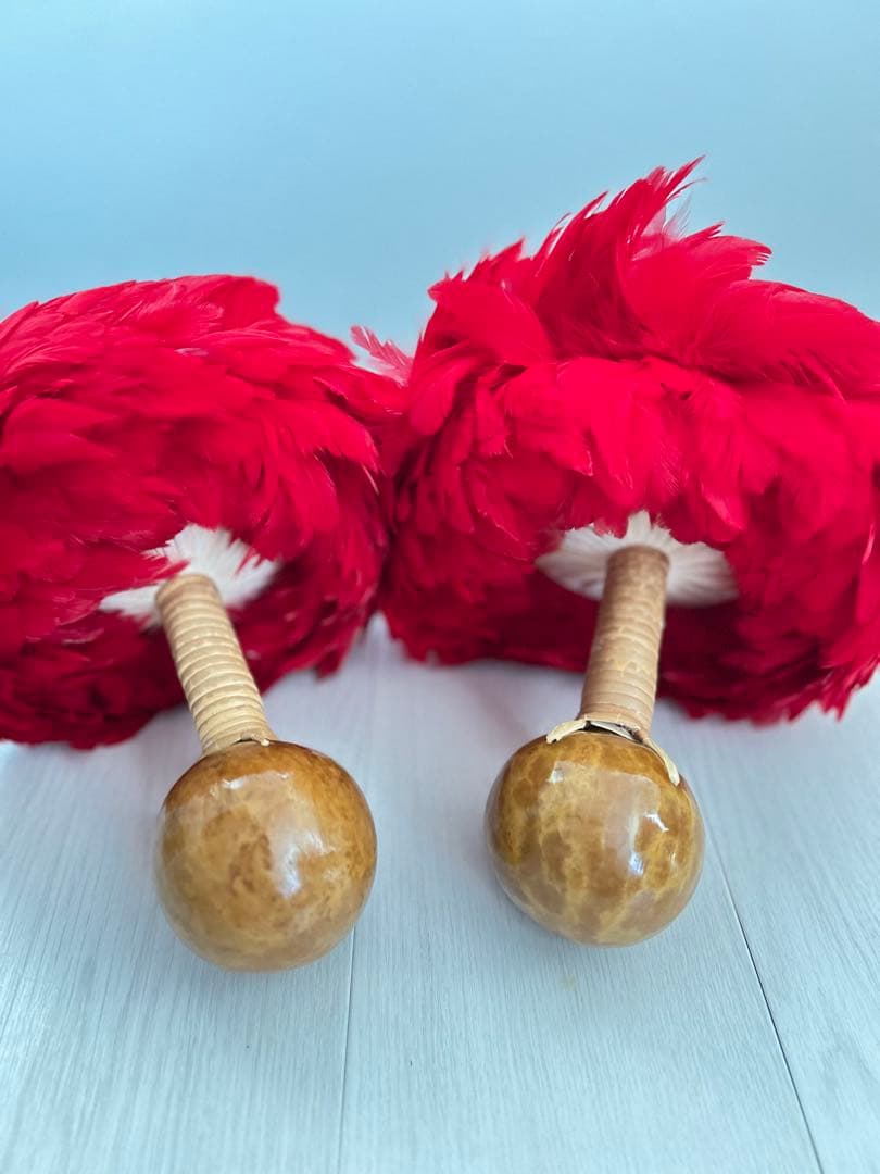 ウリウリ　フラダンス　タヒチアン　赤　羽　黄色　楽器　ハワイ　一体型　２個セット