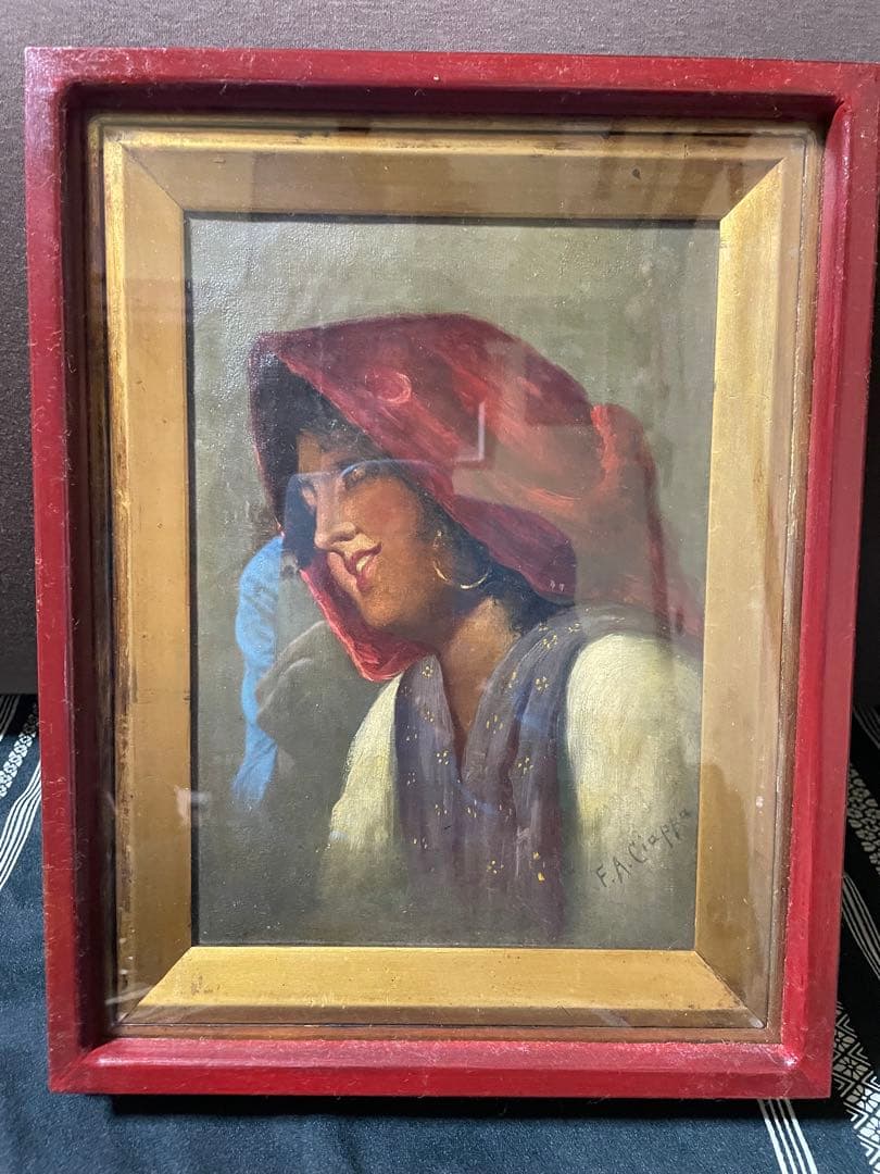 赤いフレームの人物画 FANGU