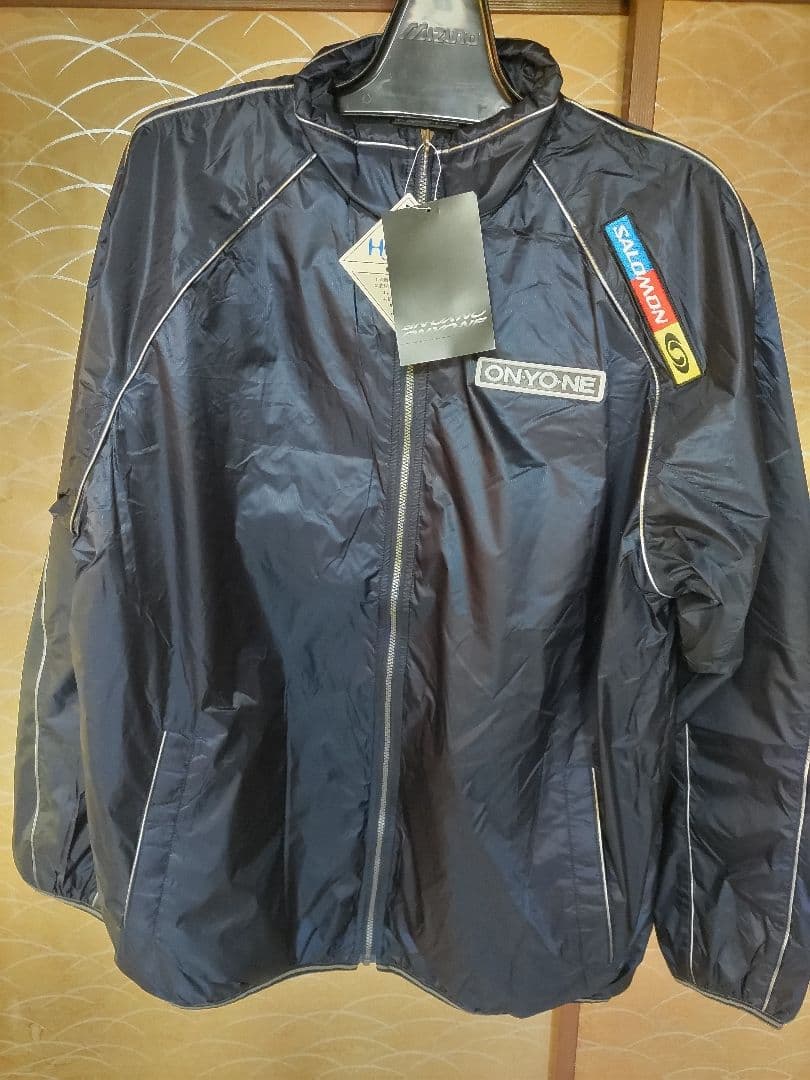 新品タグ付き保管品 ONYONE SAROMON TEAM ウインドブレーカー