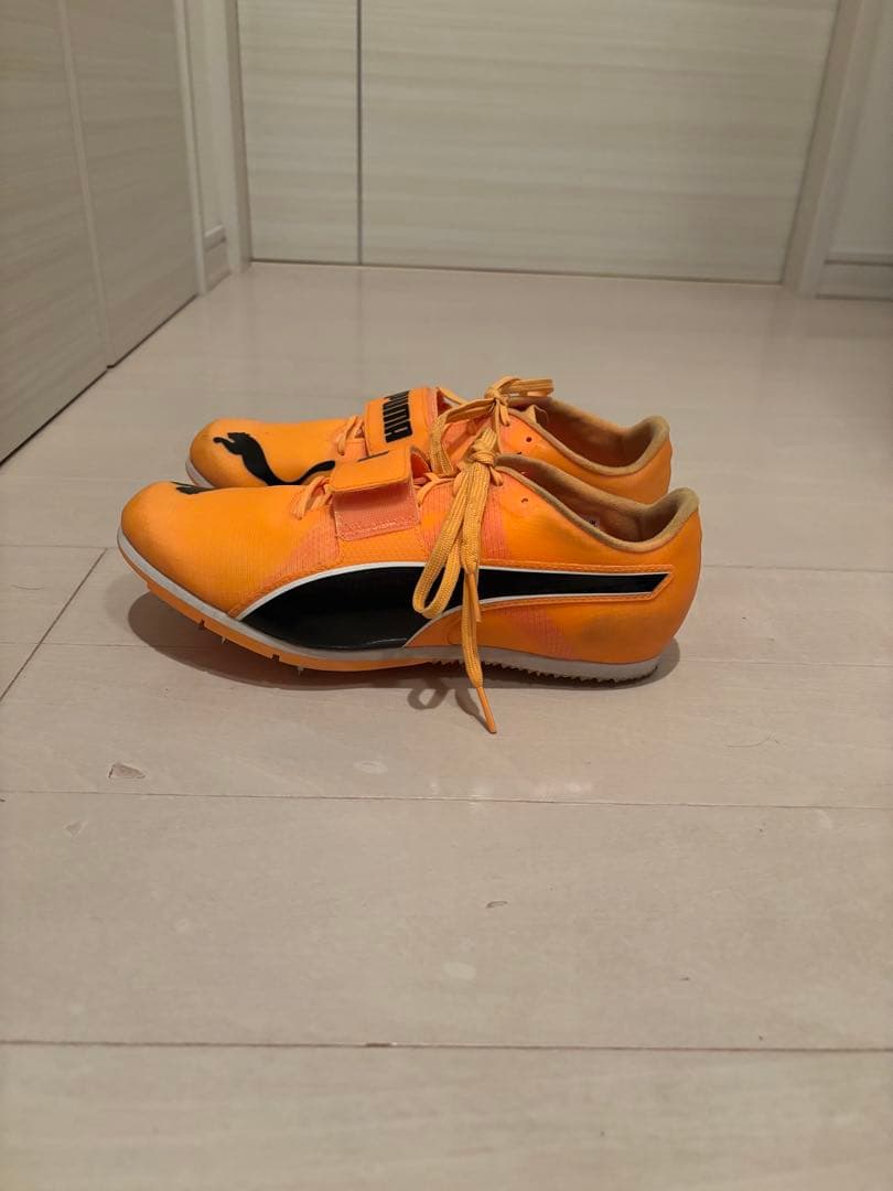 PUMA スパイクシューズ オレンジ/ブラック