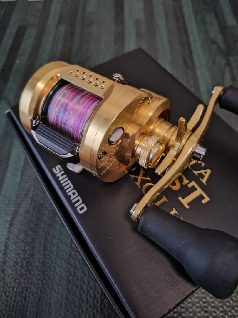リール SHIMANOCALCUTTACONQUESTMD400XGLH