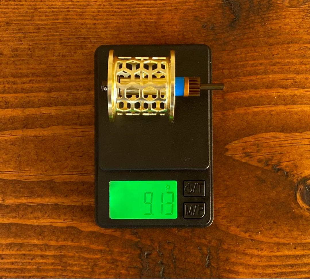 新品未使用　トラウト　ベイトリール　丸型　リール　グリーン×ゴールド　渓流釣り