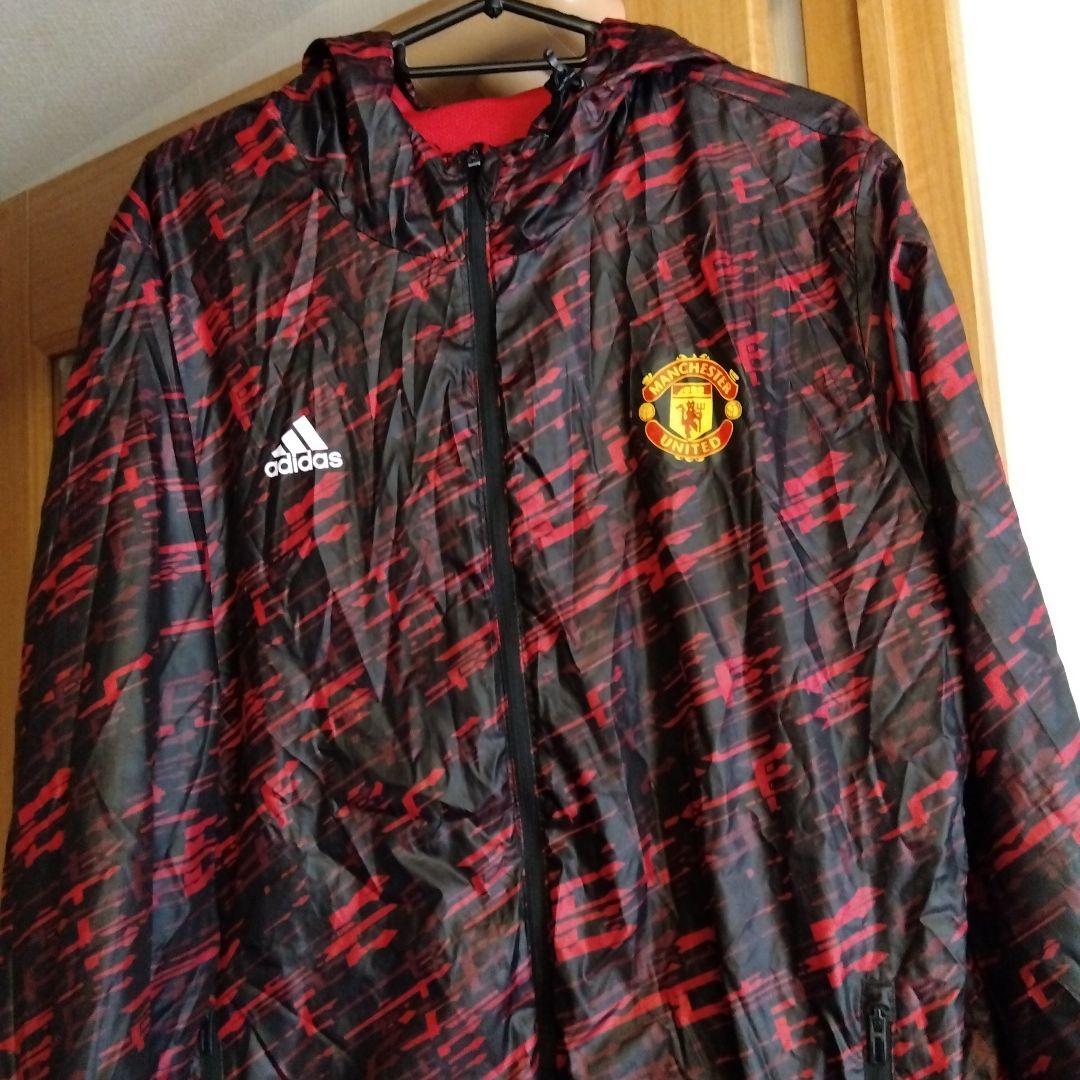 アディダス マンチェスターユナイテッドのウインドブレーカー メンズ