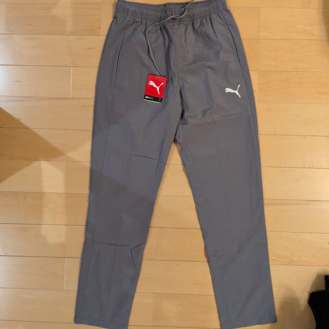新品　サイズМ　プーマ　ウィンドジャケットパンツ　セットアップ　グレー
