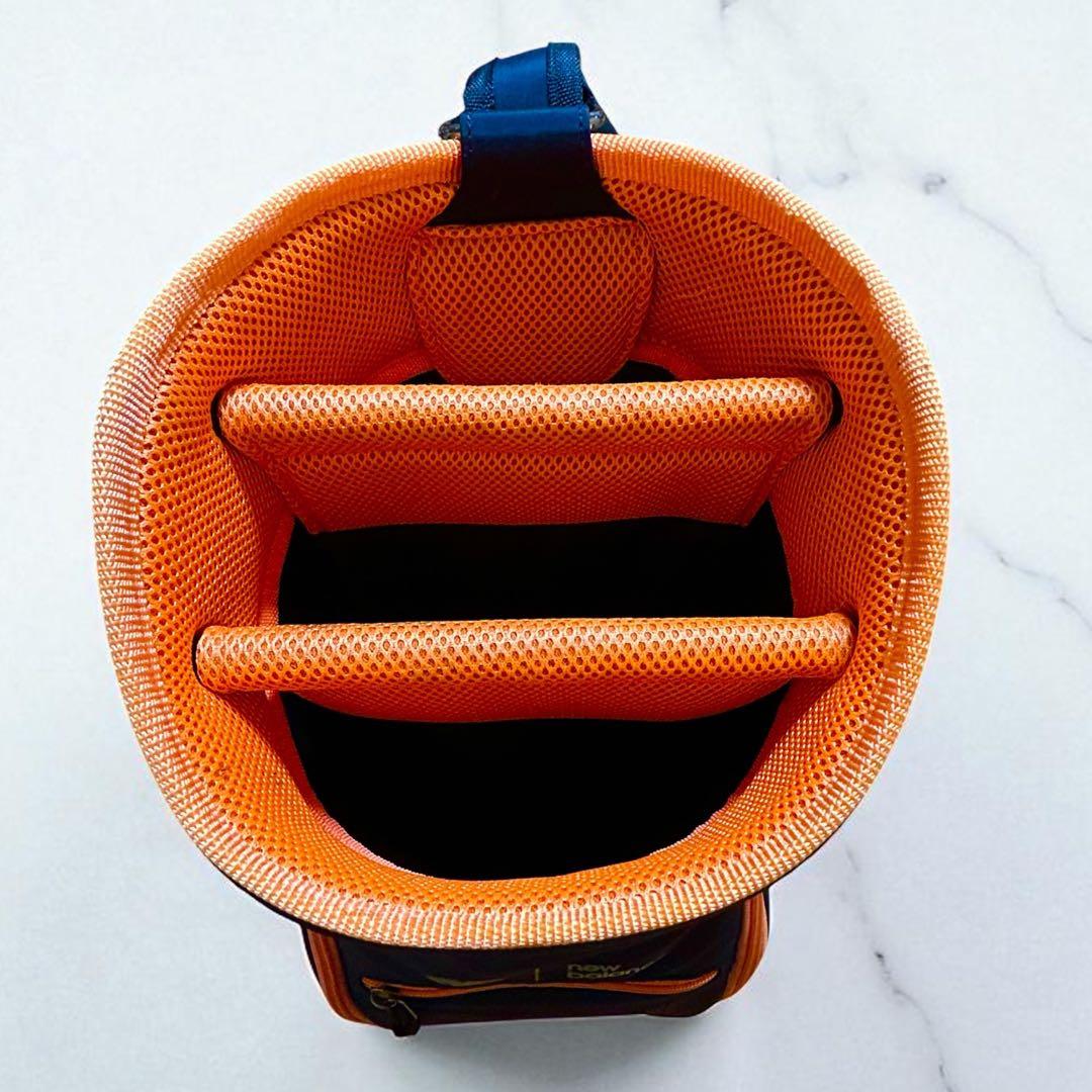 new balance ゴルフバッグ 黒とオレンジ