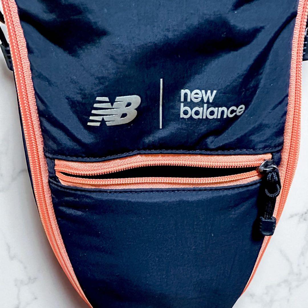 new balance ゴルフバッグ 黒とオレンジ