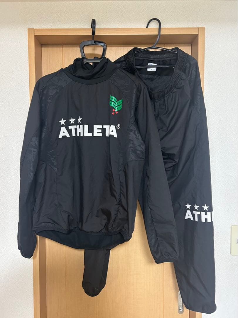 ATHLETA ピステ・ウィンドブレーカーセット ブラック　M