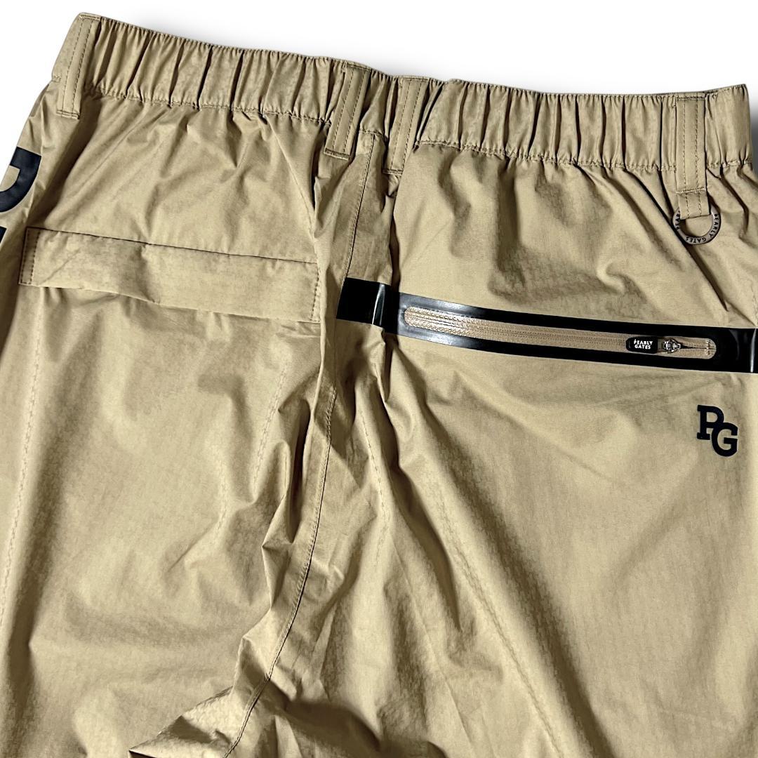 ベージュ 定価27,500円 新品 パーリーゲイツ 防水ビッグロゴレインパンツ