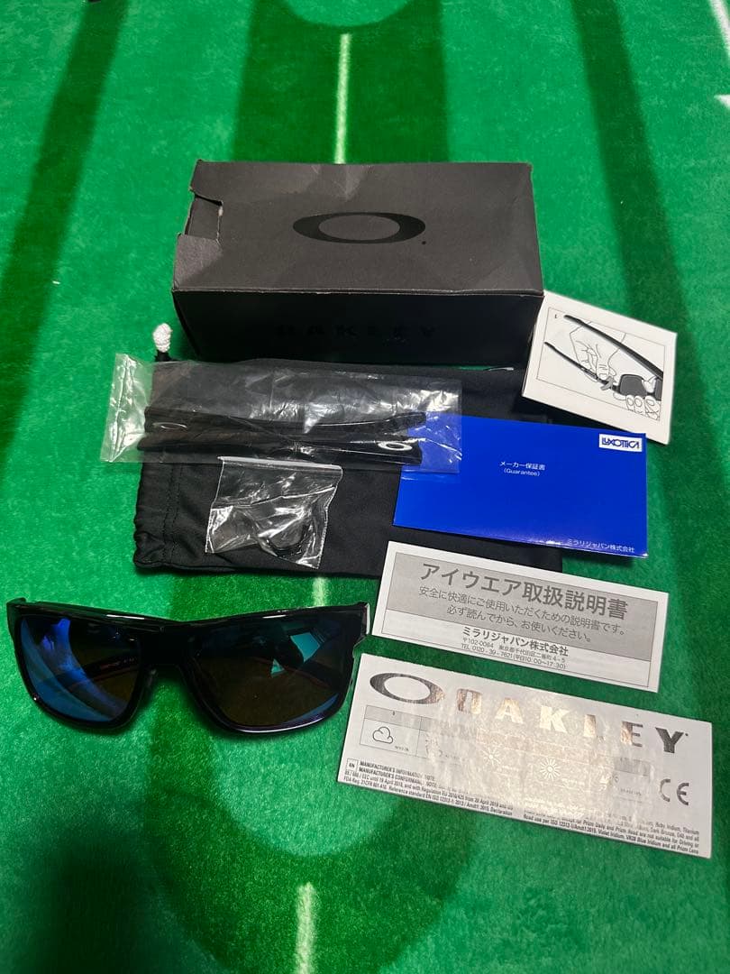 Oakley サングラス ブラックフレーム プリズム偏光レンズ ゴルフ