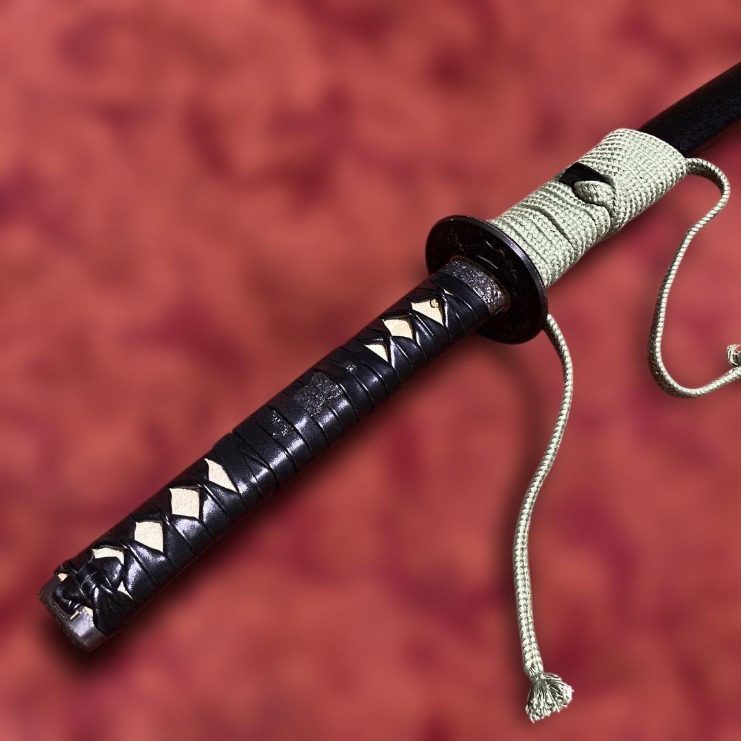 豪華居合刀 黒革巻柄 鶴松図楕円鍔 黒梨地鞘