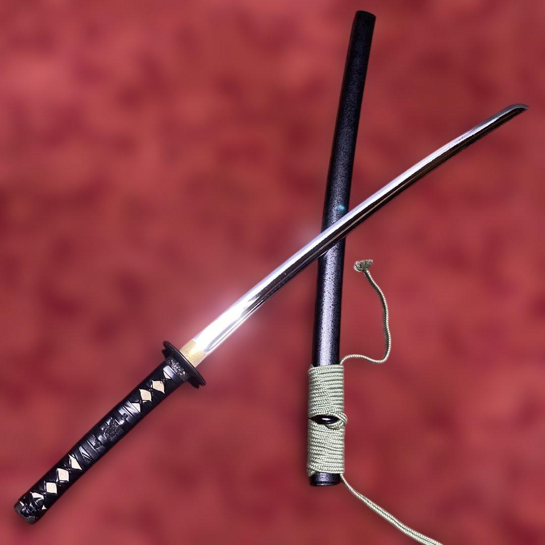 豪華居合刀 黒革巻柄 鶴松図楕円鍔 黒梨地鞘