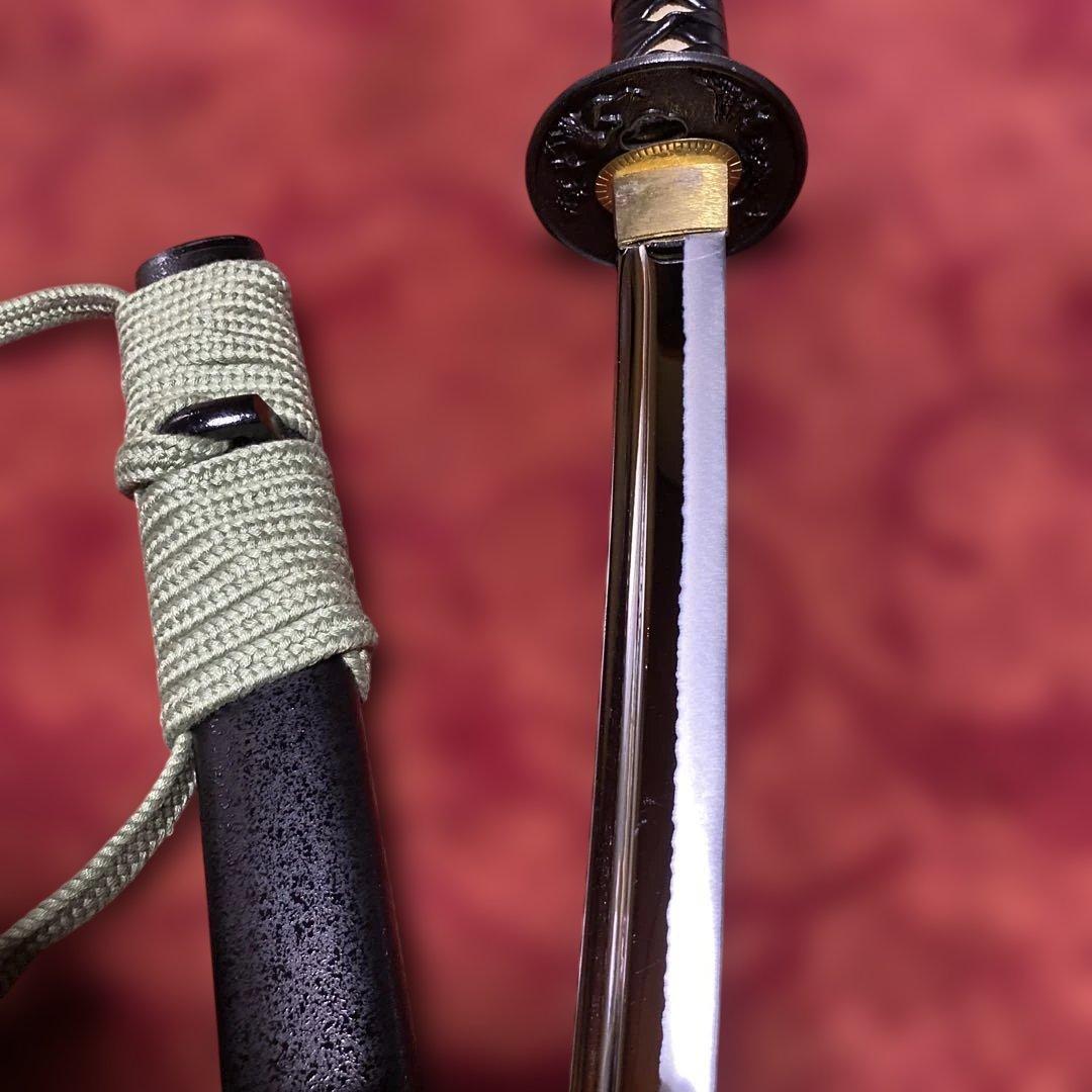 豪華居合刀 黒革巻柄 鶴松図楕円鍔 黒梨地鞘