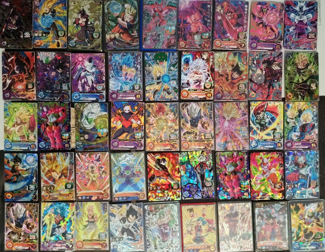 スーパードラゴンボールヒーローズカード85枚＋おまけ約200枚　引退品まとめ売り