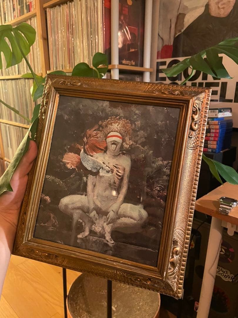 装飾的フレームの人物画