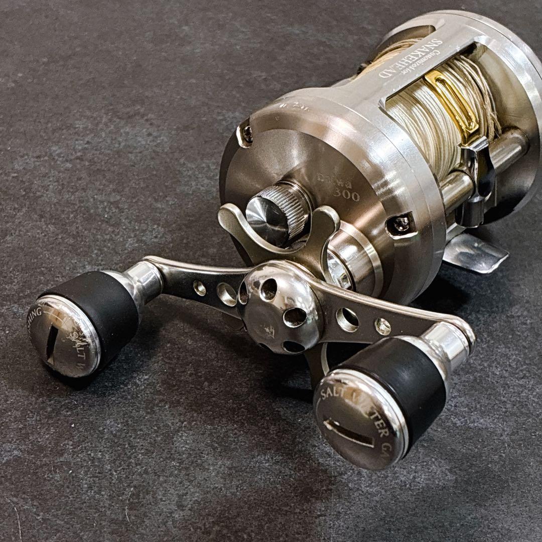 ダイワ ミリオネア スネークヘッド 雷魚用 ベイトリール 300 カスタム？