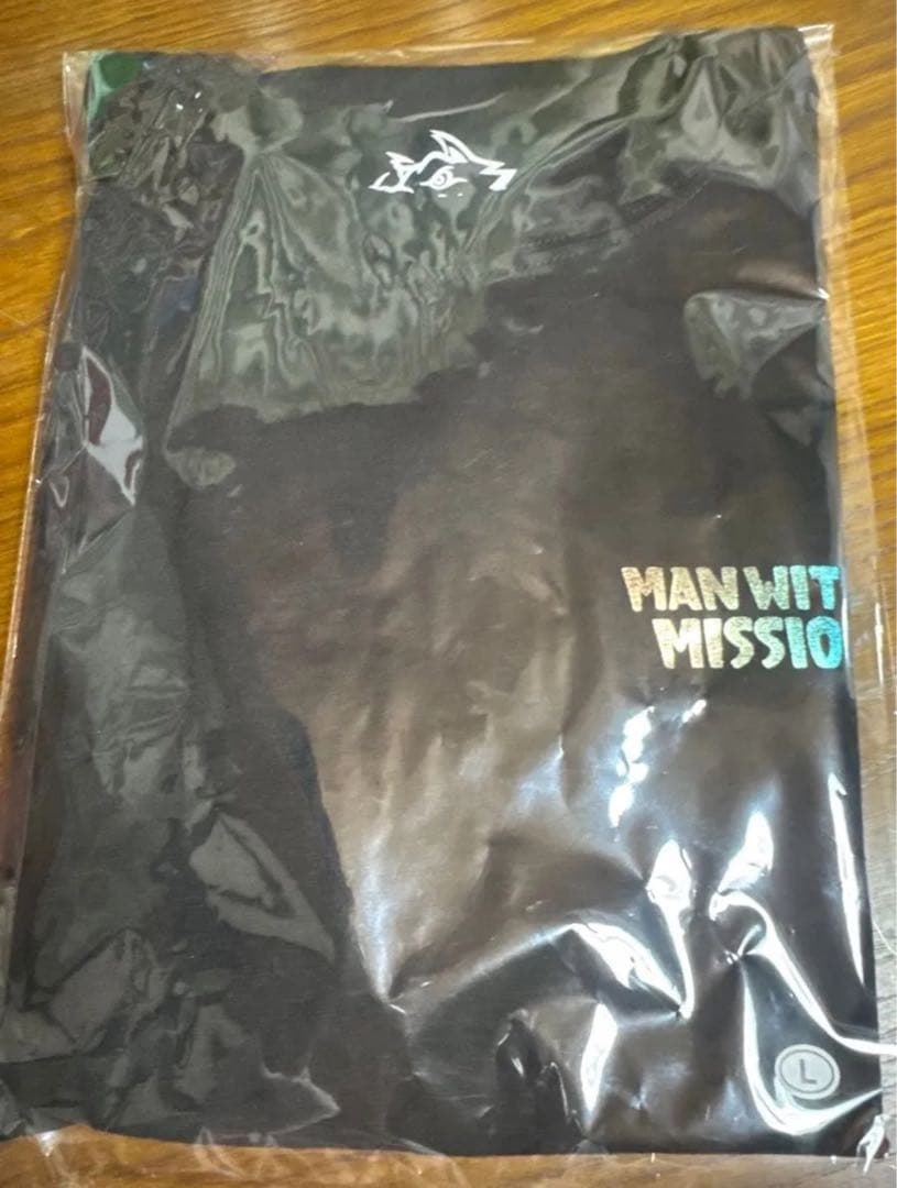 マンウィズ　Lサイズ　Too many ゴッツ ロンT（ブラック×ホログラム）