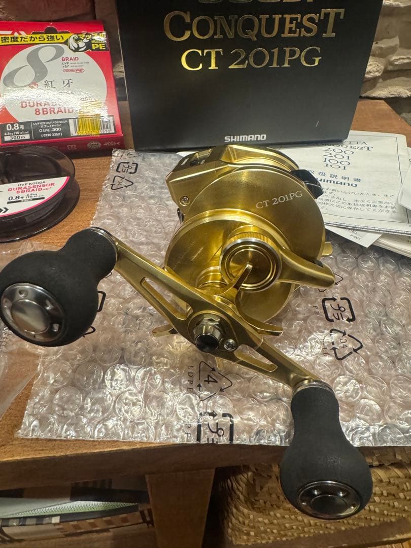 18 オシアコンクエストCT201PG シマノ左巻き＋ PE0.8号300m紅牙