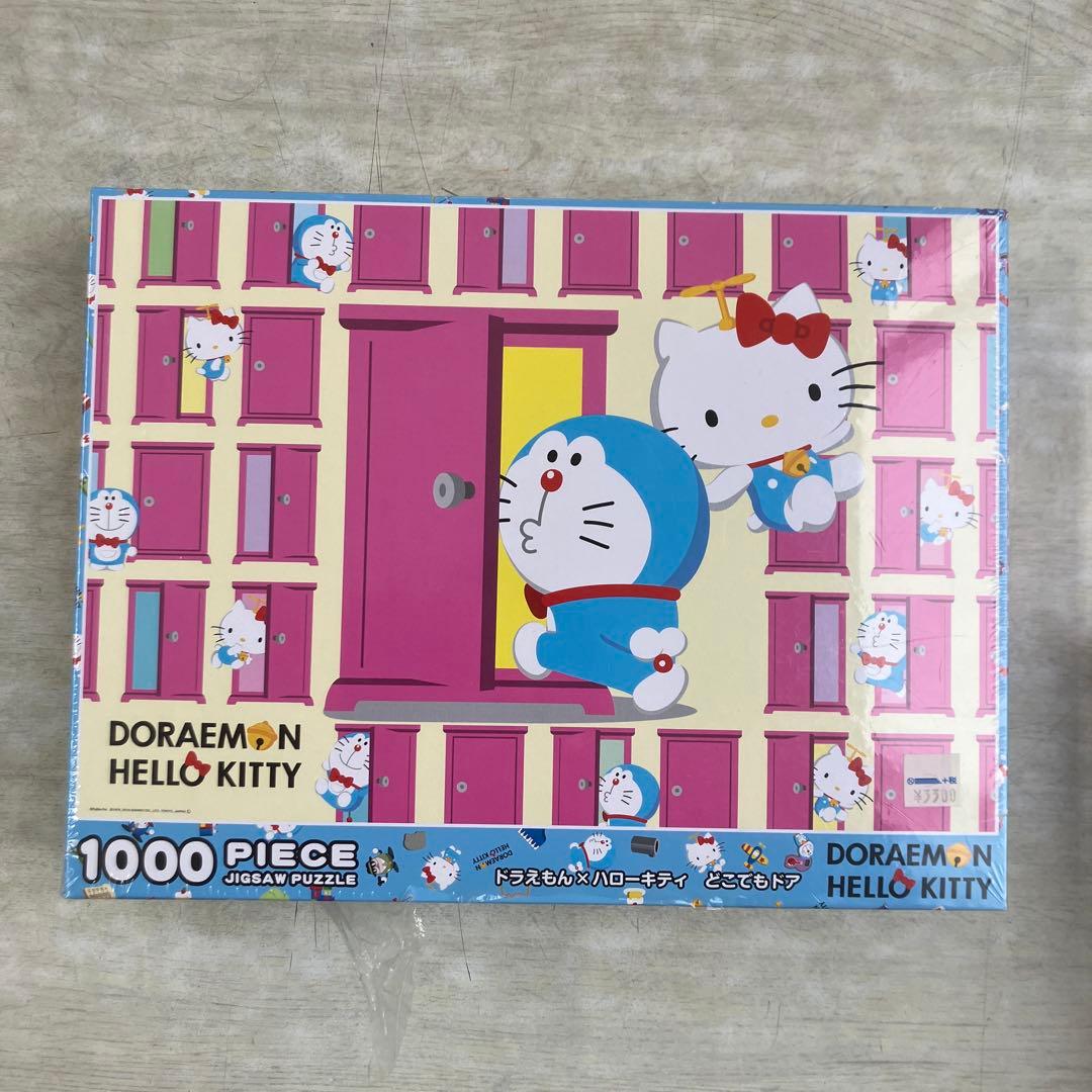 【新品】1000ピース ジグソーパズル ドラえもん×ハローキティ どこでもド