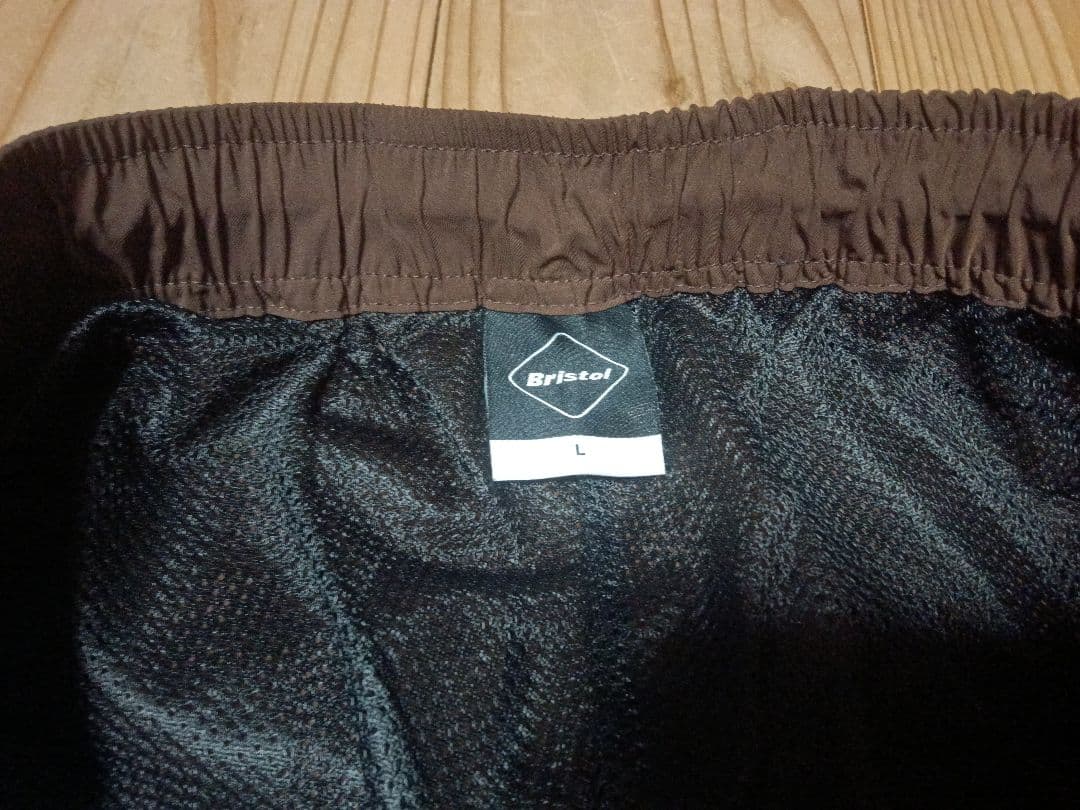 F.C.RealBristolSOPH.ウォームアップパンツブラウン✕ブラックL
