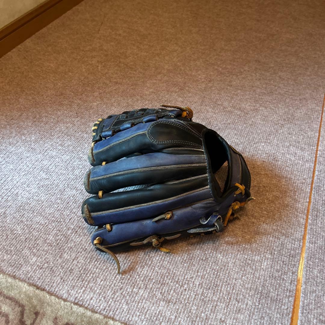 ZETT 軟式グローブ 黒/青 編み込みデザイン