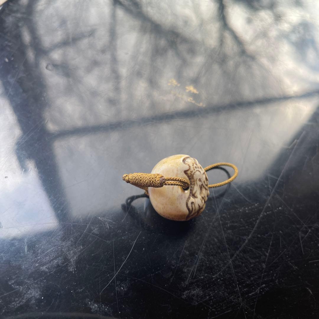 提げ物　緒締　玉龍　鹿角？